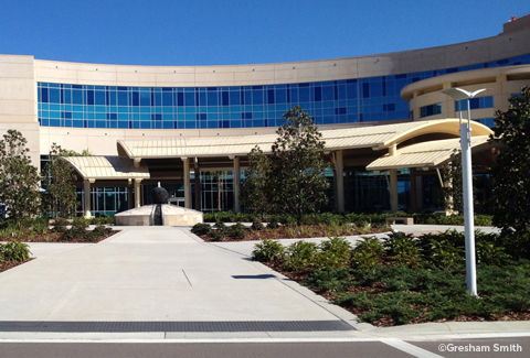 Entrance, gardens, and pathways of St. Joseph’s Hospital-South building.