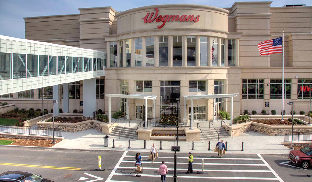 Shoppers at Wegman’s grocery store at the Natick Mall.