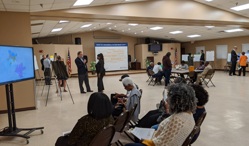 Local citizens divide into groups to discuss issues at an Orlando Future Ready meeting.