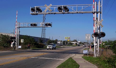 At-grade train crossing on the South Coast Rail line in Massachusetts.