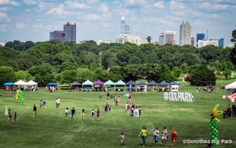 SunFest Festival at Dix Park with the Raleigh Skyline in the distance