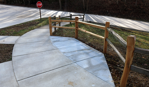 : View of the accessible trail that connects to the newly constructed pedestrian bridge.