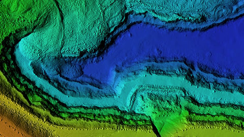 DEM - digital elevation model. Product made after proccesing pictures taken from a drone. It shows excavation site with steep rock walls