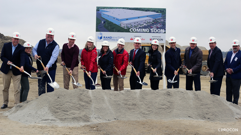 Officials with shovels for groundbreaking event.