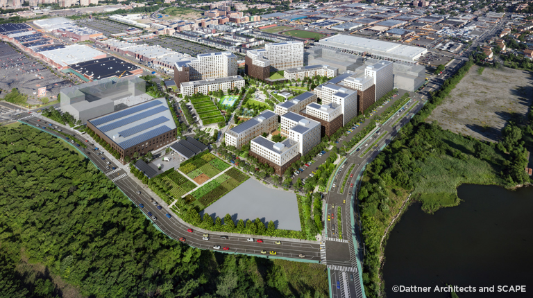 Birds-eye view of the Alafia development with buildings and greenery.