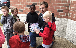 Dan Belin showing children nature